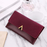 Elegant Black Women's Clutch Wallet - Long Bi-fold with Stylish Metal Accent