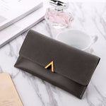 Elegant Black Women's Clutch Wallet - Long Bi-fold with Stylish Metal Accent